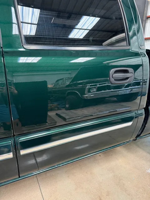 Close-up of vehicle paint and reflections