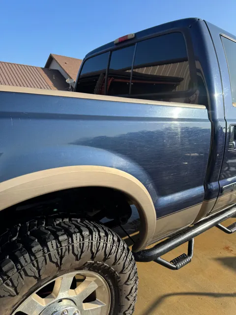 Close-up of vehicle paint and reflections