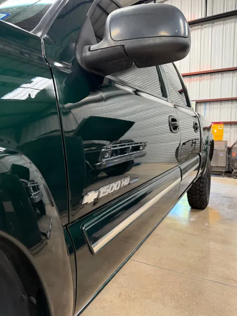 Close-up of vehicle paint and reflections