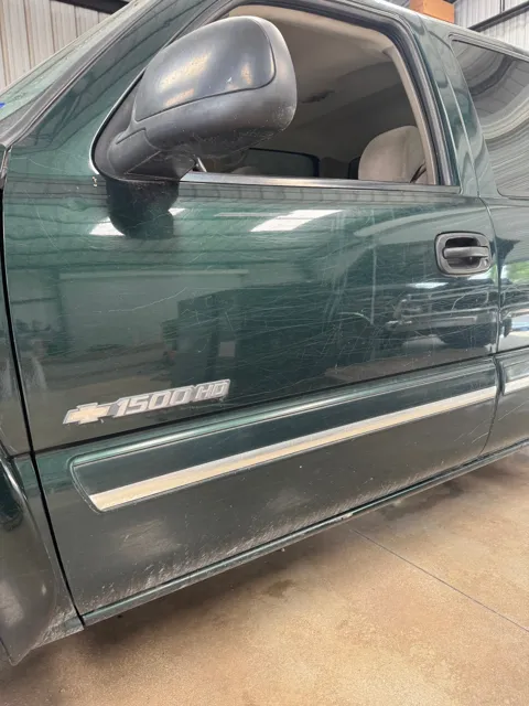Close-up of vehicle paint and reflections