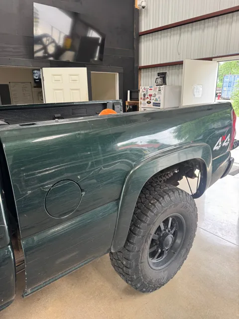 Close-up of vehicle paint and reflections