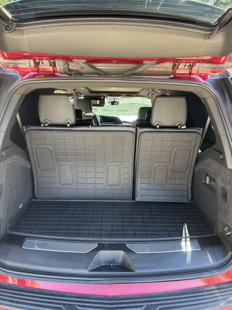 Vehicle cabin showing seats, dashboard and interior surfaces