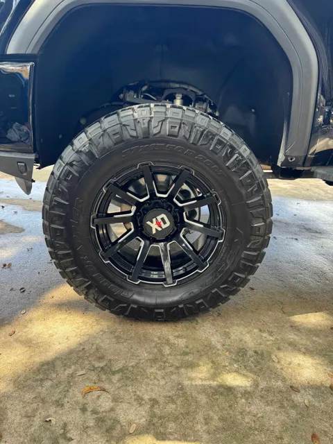 Close-up of a vehicle wheel and tire