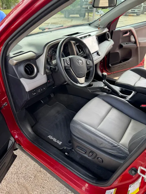 Toyota interior with a clean driver’s floor mat